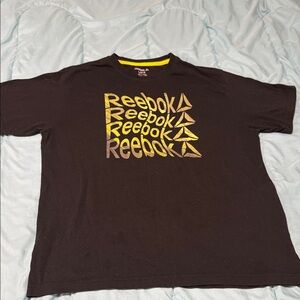 Reebok Men's Black Tee with Metallic Gold Accents